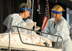 Denise Cochran, RN, BSN, (right) participated in a simulation with Joel Ottoson, RN, MSN, during the VHA breakout session of the International Meeting of Simulation in Healthcare Jan. 29
